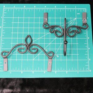 Unique Wrought Iron Plaque or Picture Frame Decoration with hook on bottom.